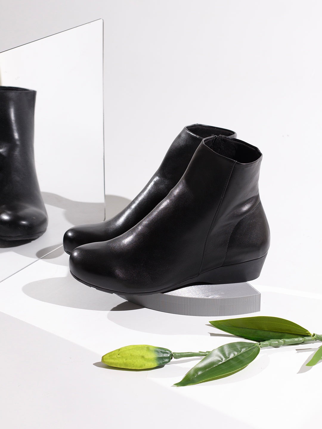 Buy Now Womens Black Party Wear Solid Round Toe Wedge Heel Ankle Boots