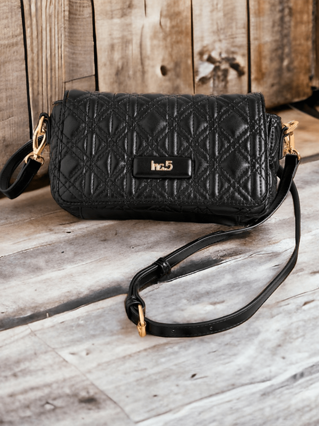 Buy Now Women Black Textured Structured Sling Bag With Quilted Detailing