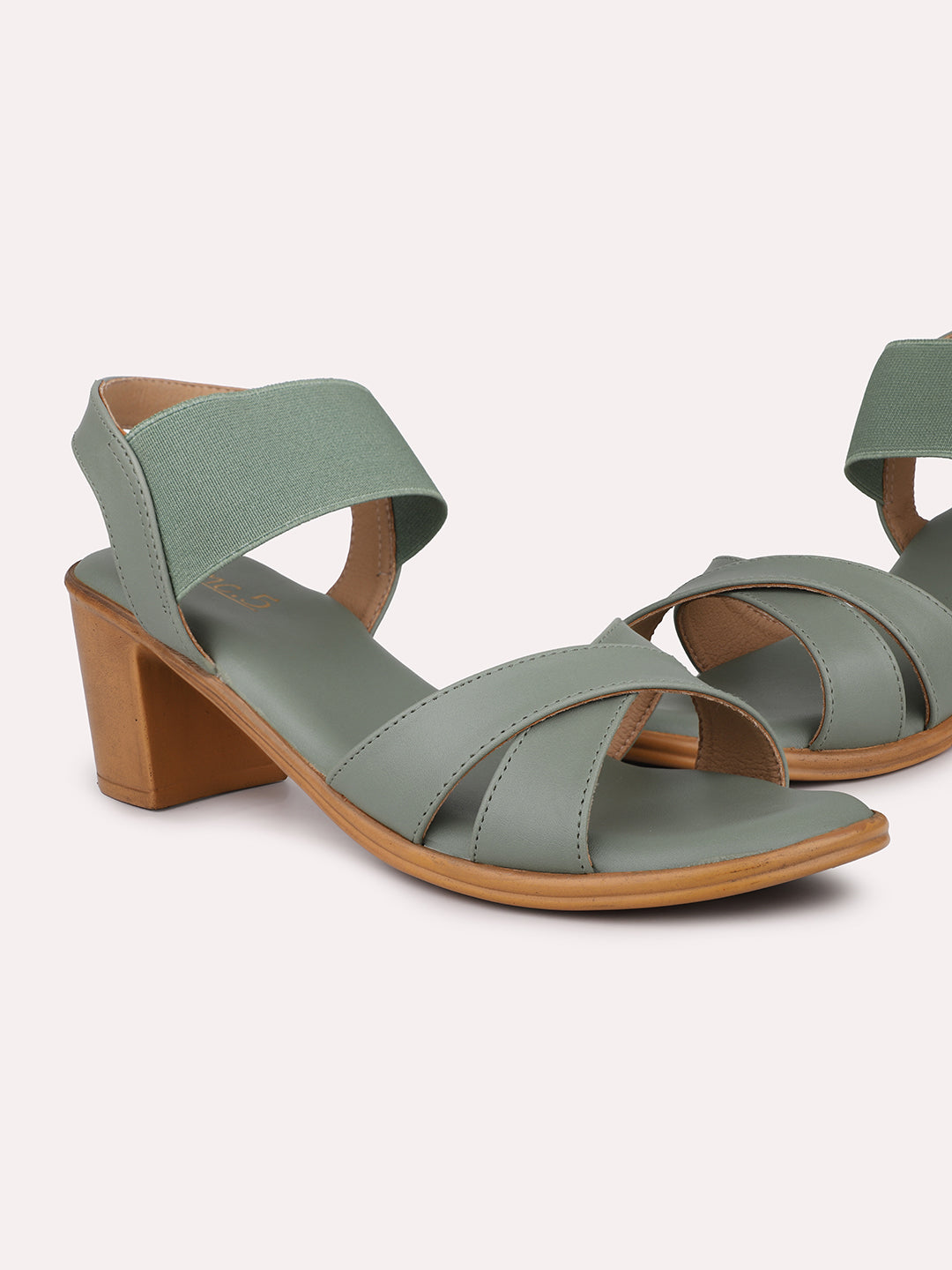 Women Green Criss-Cross Strap Block Heels With Backstrap