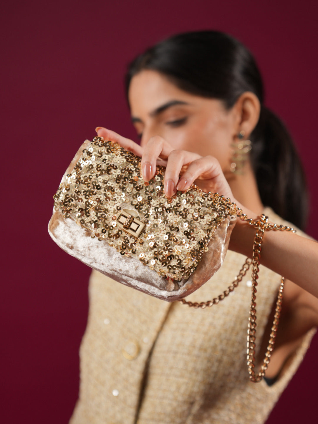 Women Ethnic Gold Embellished Sling Bag With Twist Lock