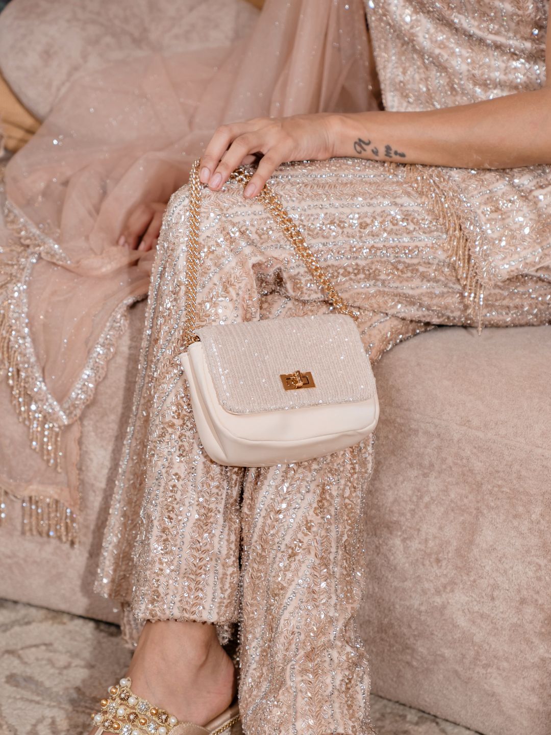Womens Beige Clutches With Twist Lock For Party Use