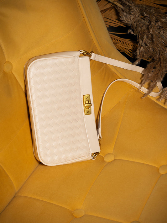 Womens Cream Textured Sling Bag With Twist Lock