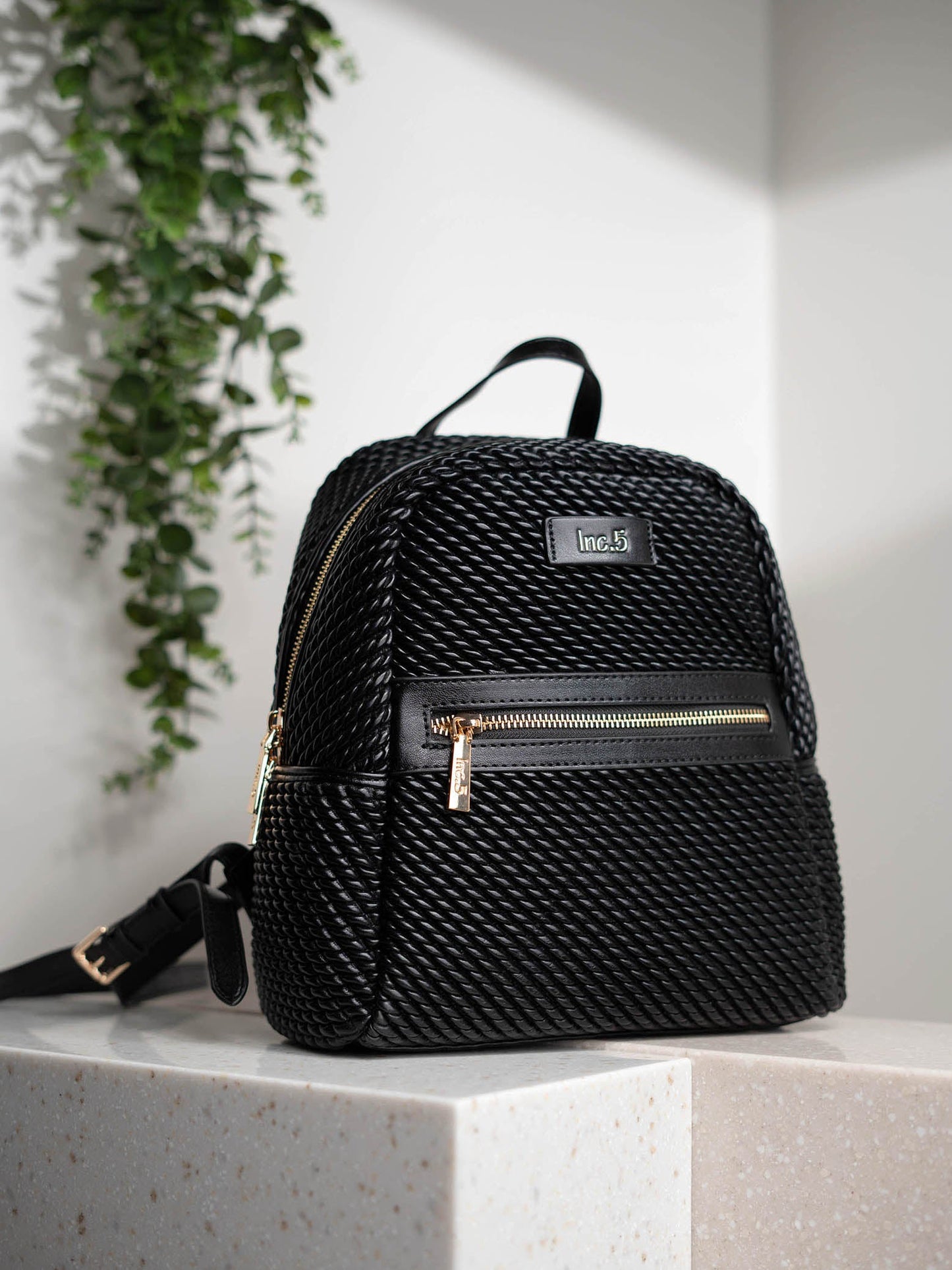 Women Black Textured Mini Backpack With Quilted Detailing