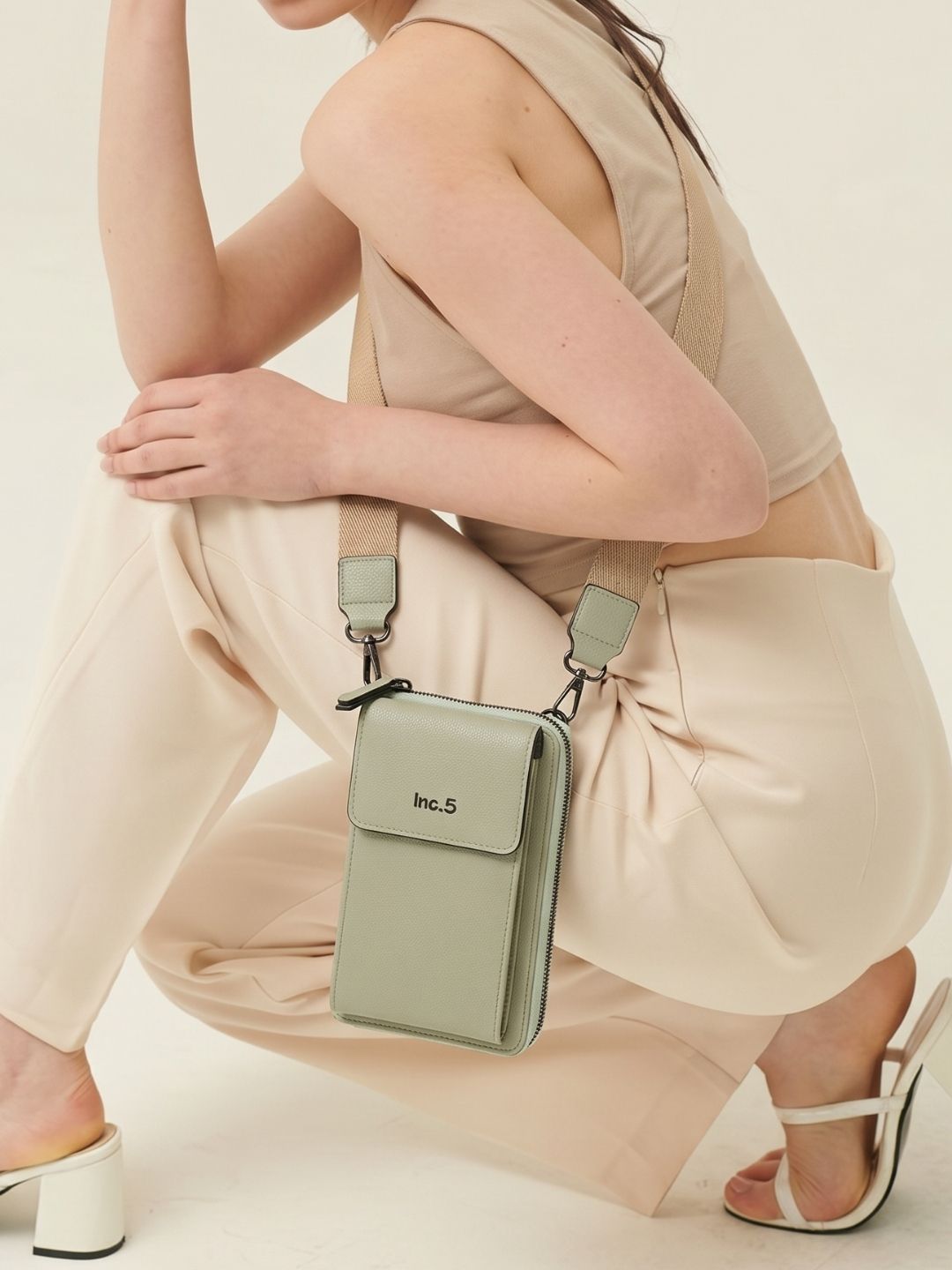 Women Green Textured Sling Bag With Zip Lock For Casual