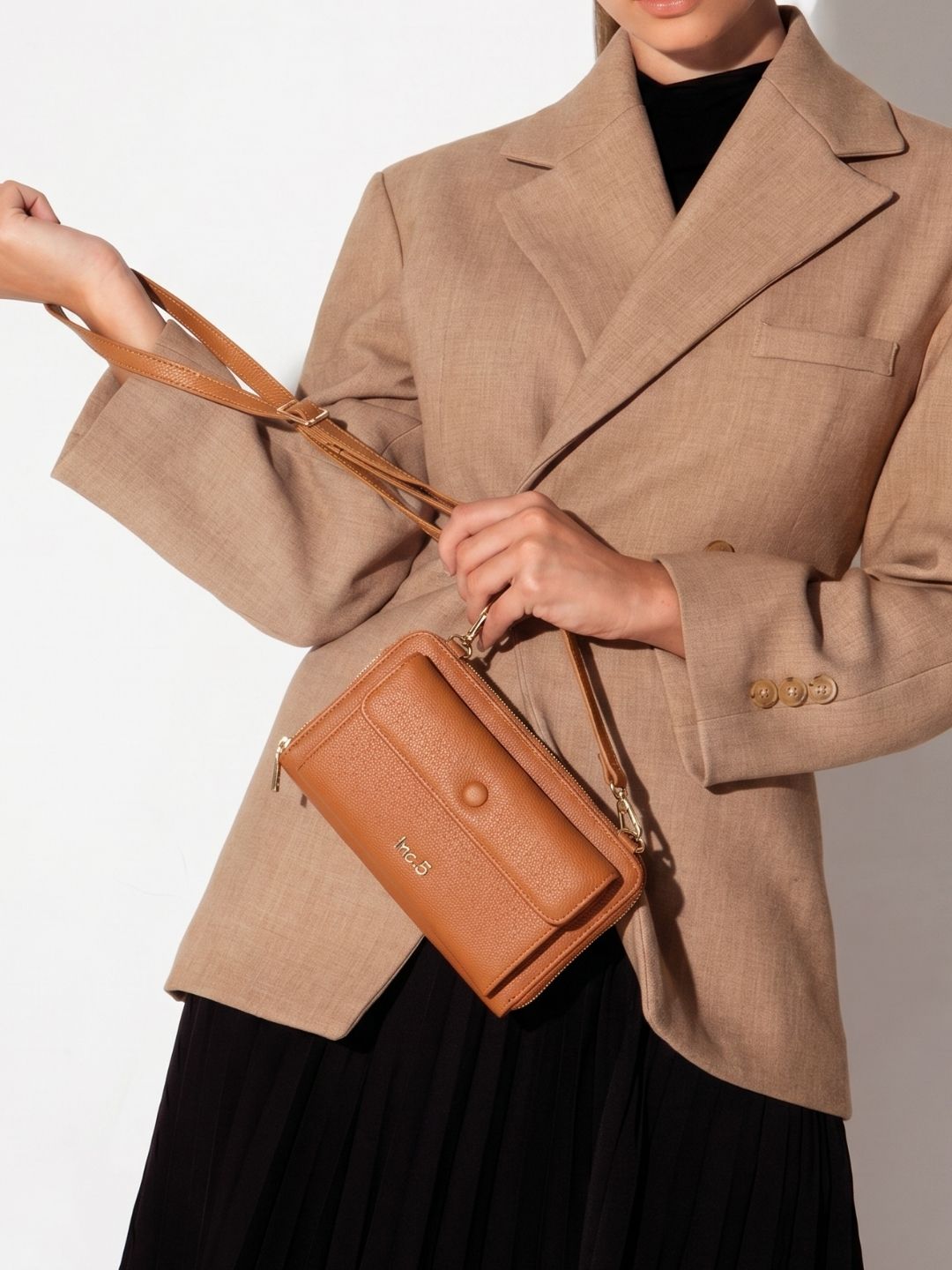 Women Tan Textured Sling Bag With Zip Lock For Casual