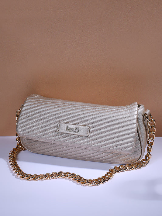 Womens Gold Textured Sling Bag