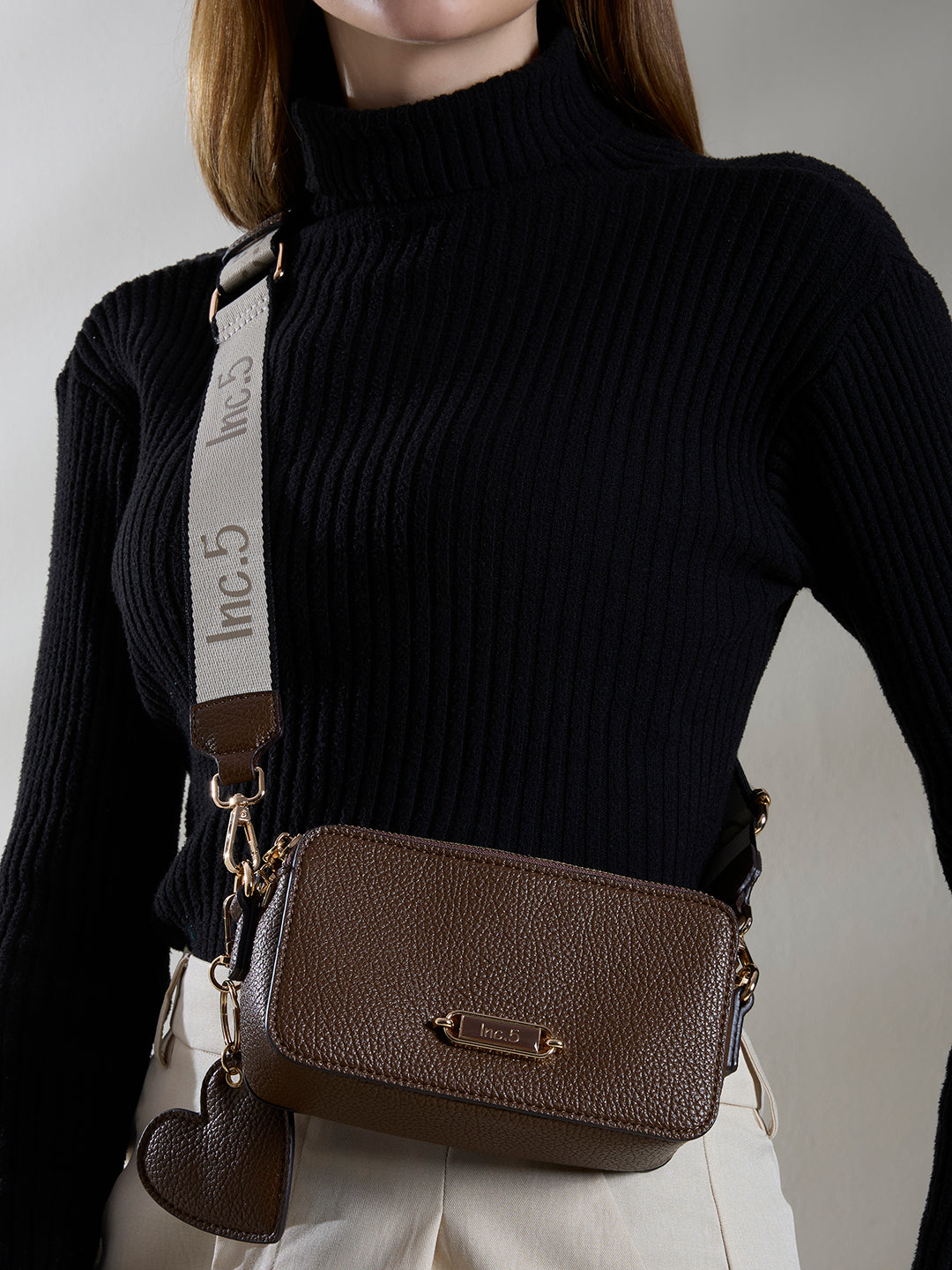 Womens Brown Sling Bag With Zipper Lock For Party Use