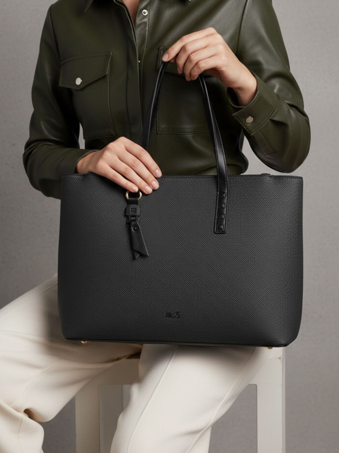 Women Black Textured Shoulder Bag With Zip Lock For Casual