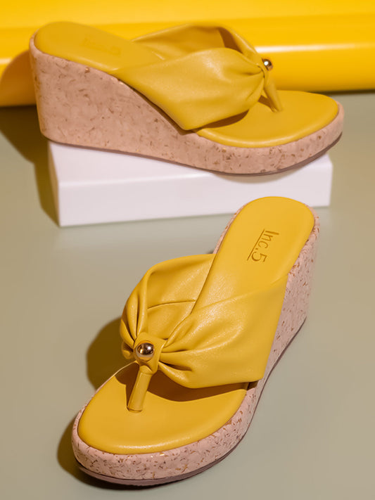 Women Yellow Solid Wedge Heels