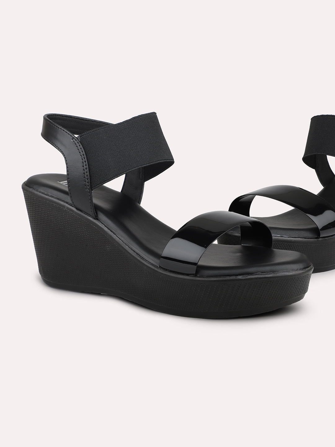 Buy Now Women Black Solid Open Toe Wedge Heels - Main Image